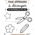 Un enfant utilisant des ciseaux pour découper un modèle coloré en classe de Maternelle.