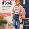 Jeune élève portant une tenue tendance pour le premier jour d'école, souriant